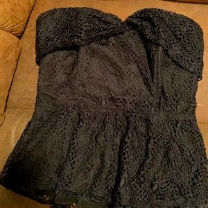 Cute and flirty black sleeveless top